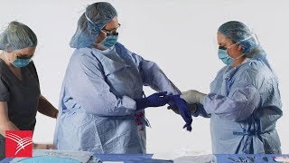 Protexis™ Surgical Gloves Assisted Donning [upl. by Ailey885]